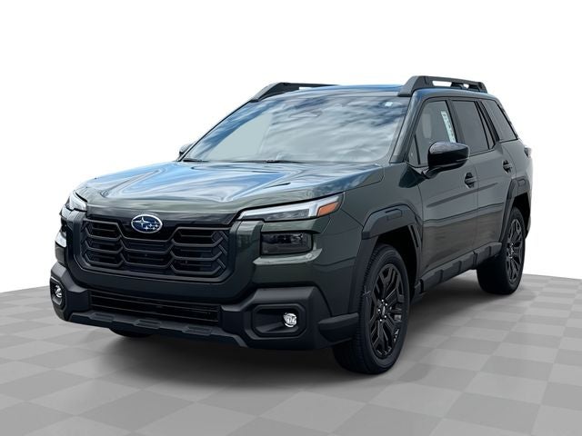 2026 Subaru OUTBACK Limited XT in Deep Emerald Green Pearl — front three-quarter view